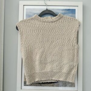 Cut off sweater. Thick material. Size small. Never worn